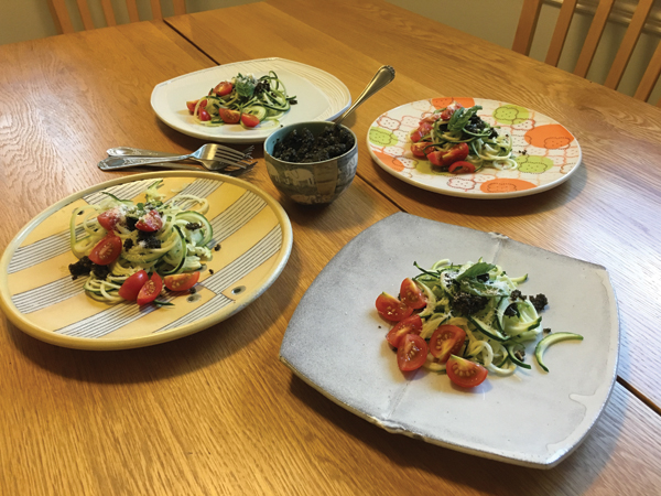 Dinner is served...I tried my hand at plating a mid-summer-night’s meal of spiralized zucchini, homemade pesto, and tomatoes from the garden on handmade plates. Clockwise from top: Plates made by Bryan Hopkins, Meredith Host, Birdie Boone, and Lorna Meaden. The pesto bowl in the middle was made by Martin Möhwald.