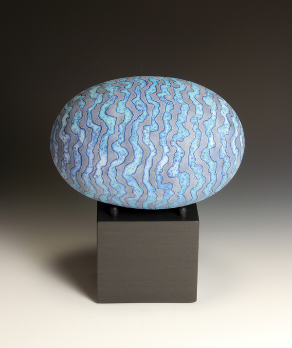 Dark blue egg form on a stone base, 9½ in. (24 cm) in height, stoneware, glaze, wax-resist decoration, fired to cone 9.