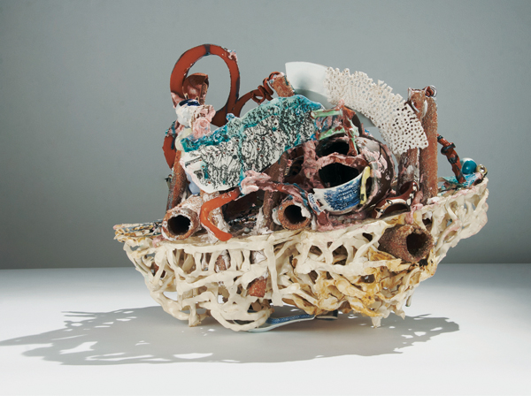 11 Linda Sormin’s List, 23 in. (58 cm) in length, earthenware with found shards, figurines, 2013.