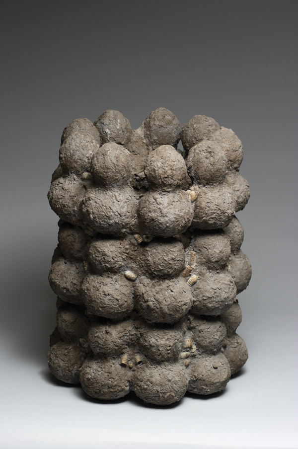 4 Tributary, 19 in. (48 cm) in height, clay, cement, sand from Africa, Louisiana sugar, earth from Congo Square, lead shot from the siege of Port Hudson, Louisiana (1863), 2014.