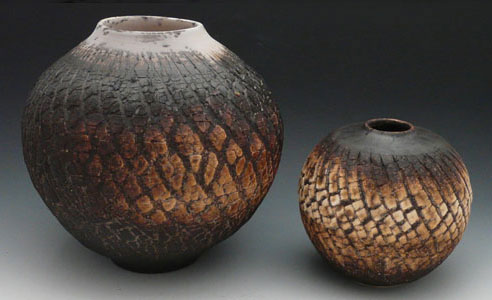 Finished pots fired with the obvara firing technique, by Marcia Selsor