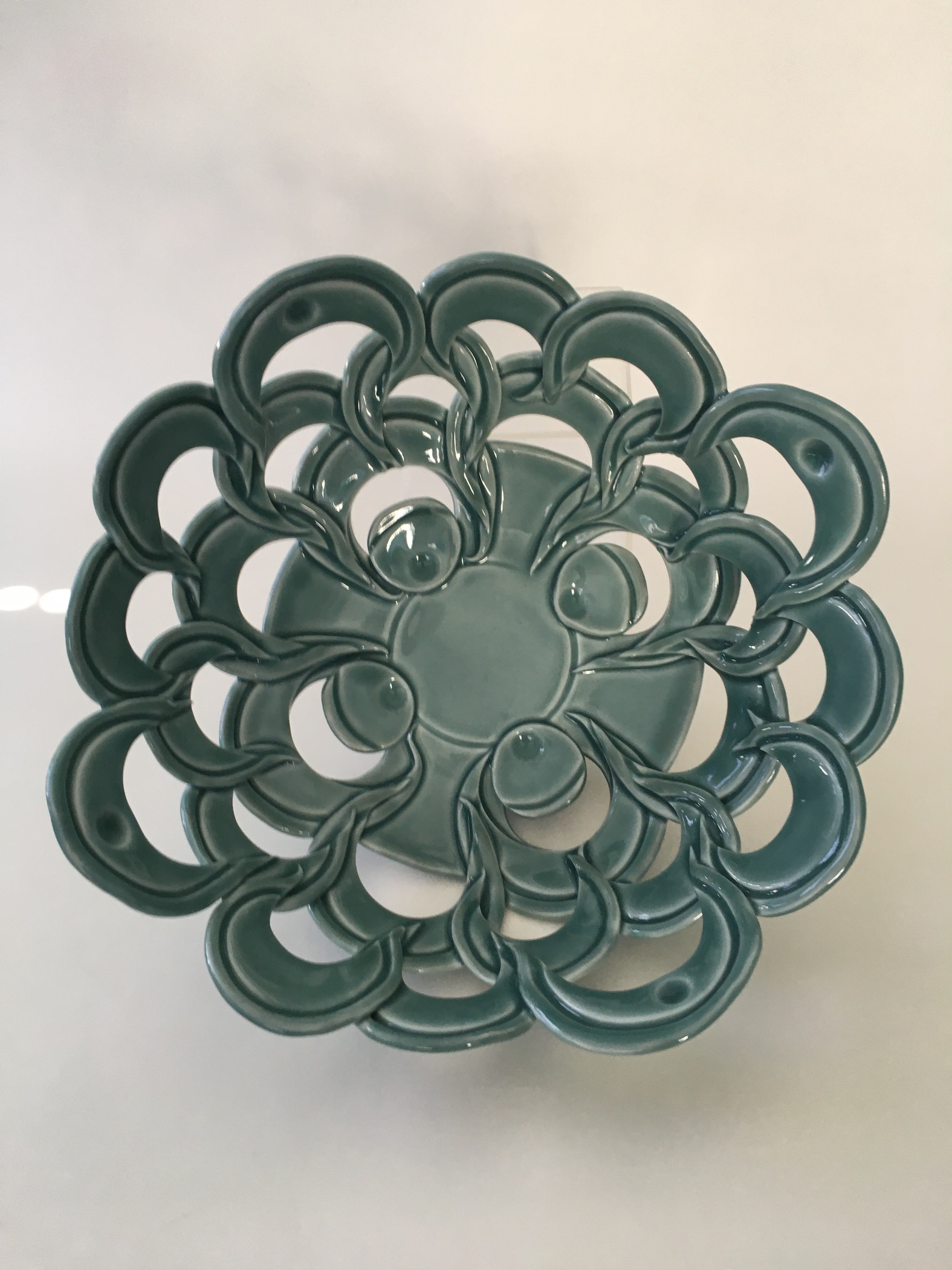 Marion Angelica’s lattice fruit bowl, 12 in. (30 cm) in diameter, handbuilt porcelain, fired  to cone 10 in reduction, 2021.