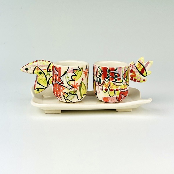 Jennifer Rosseter: Wild Child demi-tasse cup set, 3.75 in. (10 cm) in width, stoneware, underglaze, underglaze transfer, glaze, fired to cone 5 in an electric kiln, 2022.