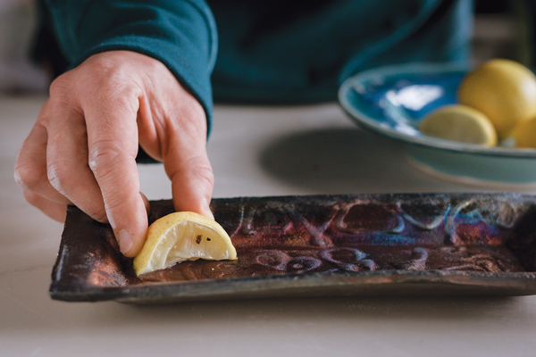 Place the lemon wedge into the juice, and leave it out overnight to allow the acid enough time to affect the glaze.